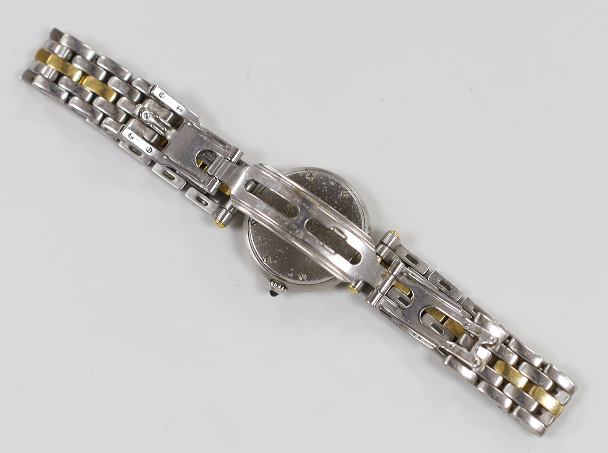 A lady's steel and gold Cartier Panthere quartz wrist watch, with Roman dial, case diameter 24mm, on a steel and gold Cartier bracelet, no box or paperwork.